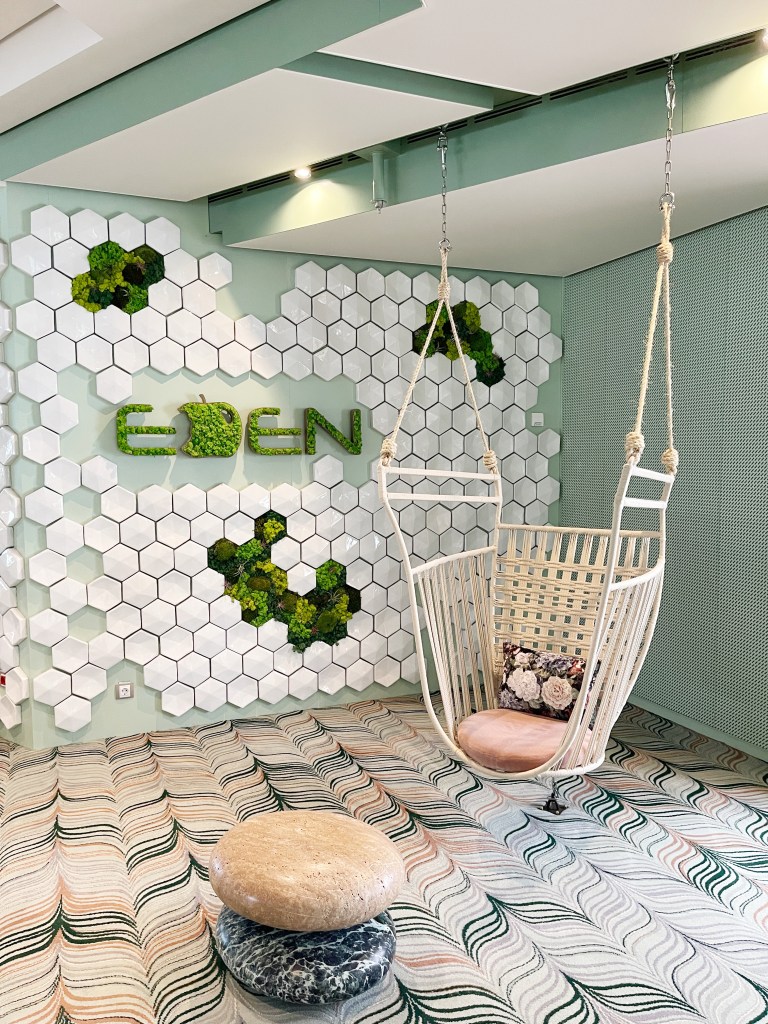 A hanging swing and an Eden sign