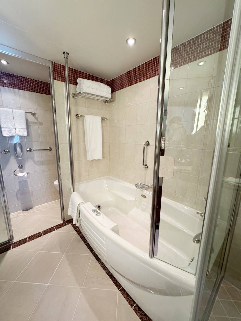 A large bath in a cruise ship suite bathroom