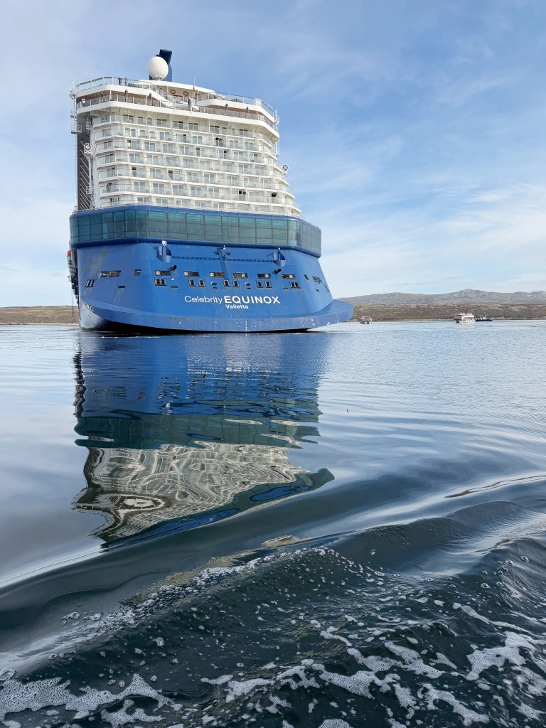 A photo of the aft of Celebrity Equinox from a tender