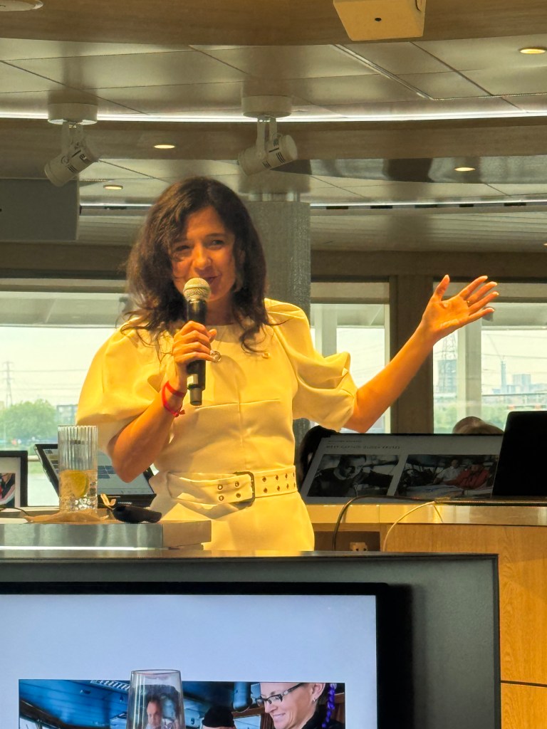 A photograph of Natalya Leahy  CEO of Lindblad Expeditions in the Ice Lounge on National Geographic Endurance