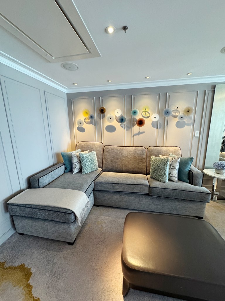 Crystal Penthouse Lounger area, with a large L shaped sofa.