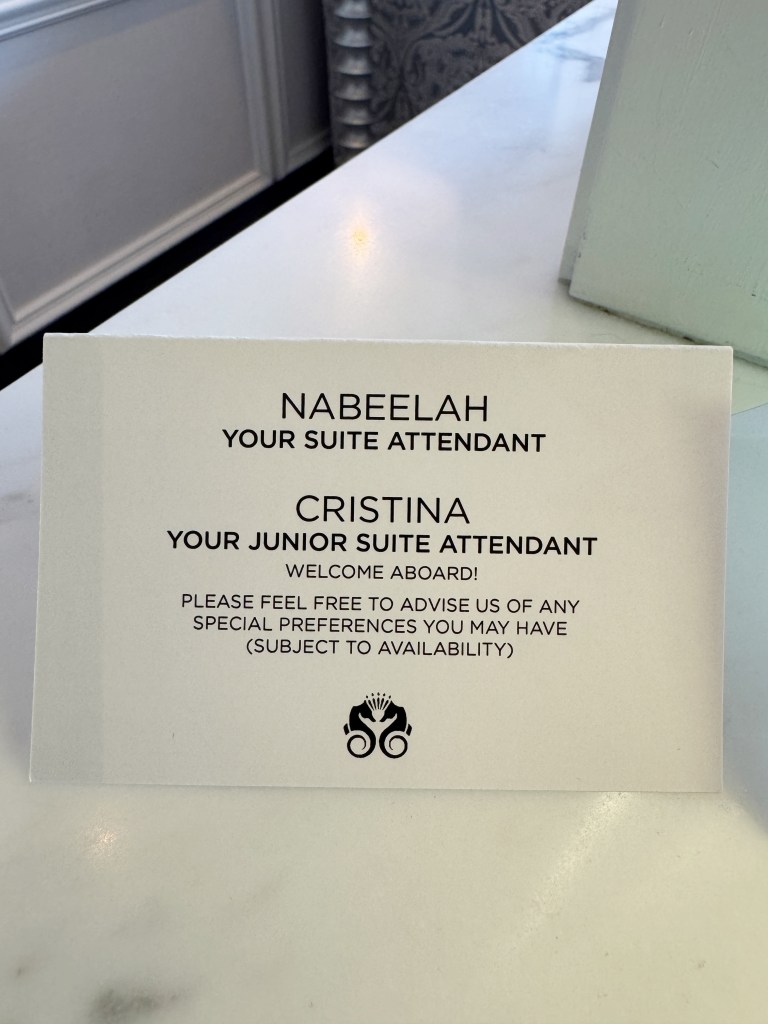 A card giving Suite attendants contact details.