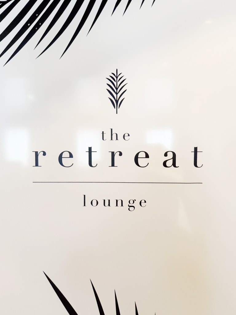 A Retreat Lounge sign