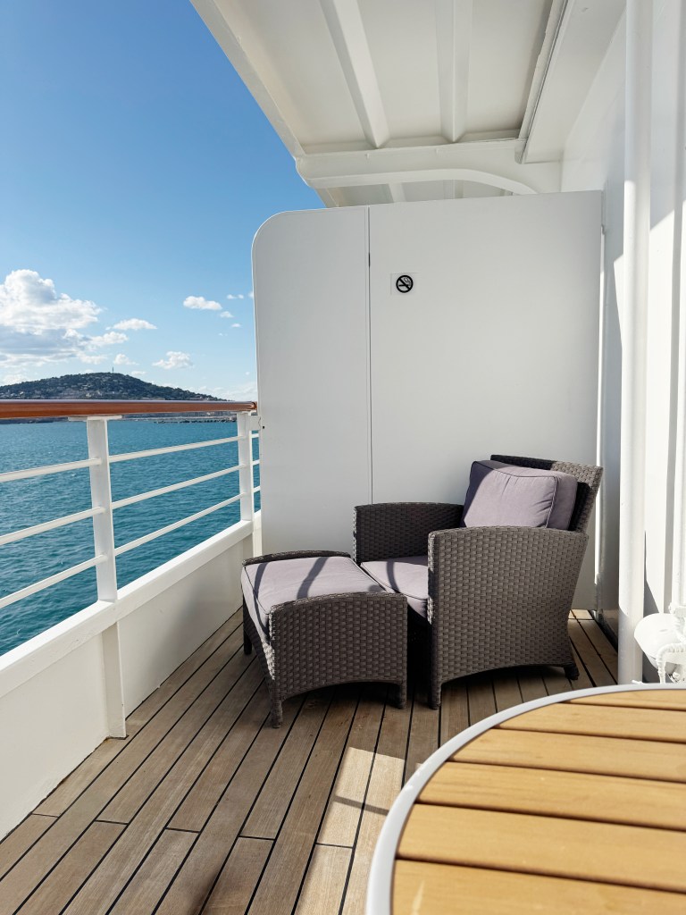 A comfortable lounging chair and foot stool on the Veranda
